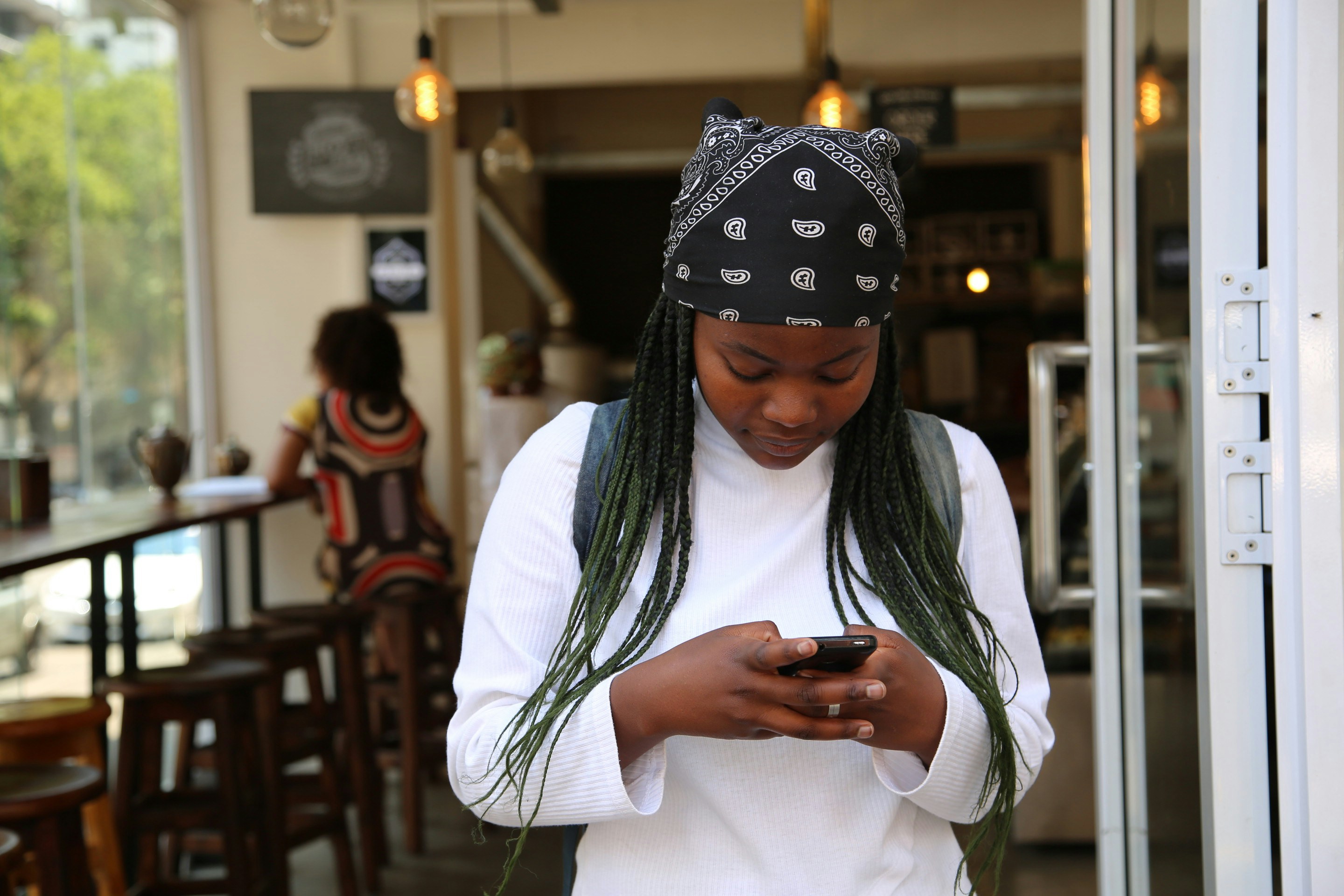 Mobile sales team collaborating in the field. Photo by Angelo Moleele on Unsplash.